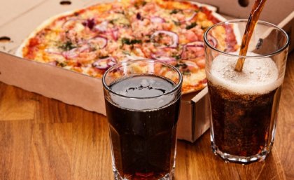 Pizza and soft drink.